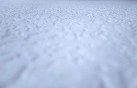 White bumpy wall surface bokeh background Stock Photos