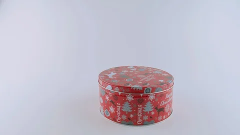 White bunny in Santa's hat gets out from present box, stands up on two legs Stock Footage 94842564