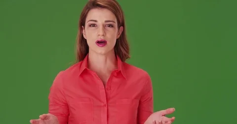 White businesswoman talking to the camera on green screen Stock Footage