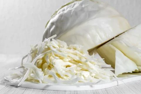 White cabbage on the board. Stock Photos