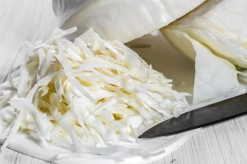 White cabbage on the board. Stock Photos