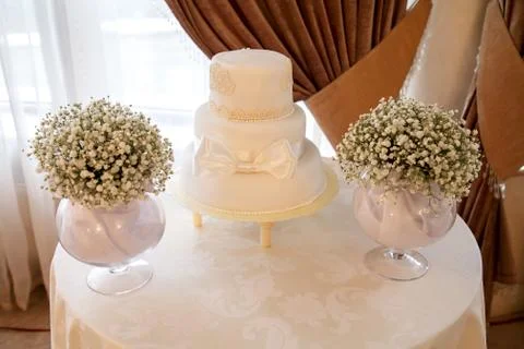 White cake with bow Photos