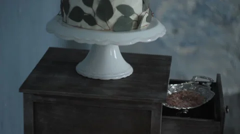 White Cake Fine Art on the Table. Fresh Leaves. Stock Footage 65662584