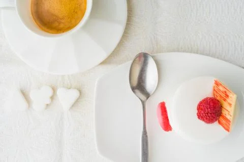 White cake with raspberry and coffee top view Stock Photos