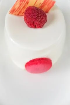 White cake with raspberry Stock Photos