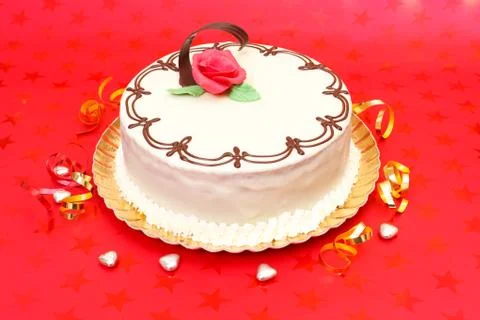 White cake on red background Stock Photos