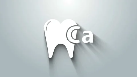 White Calcium for tooth icon isolated on grey background. Tooth symbol for Stock Footage 145859221