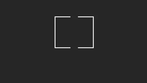 White call to action text emerging inside white frame, fragmenting against dark Stock Footage 308027780