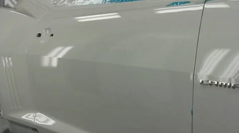 White Camaro in the paint booth Stock Footage 36534323