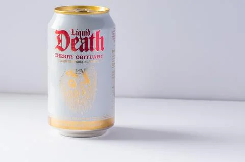 White can of Liquid Death Cherry Obituary flavored sparkling water on a whi.. Stock Photos
