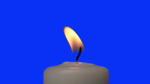 White Candle with flame. shot in blue screen 4K Stock Footage 150214034