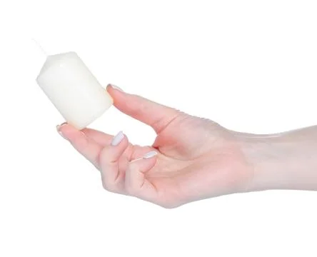 White candle light in hand Stock Photos