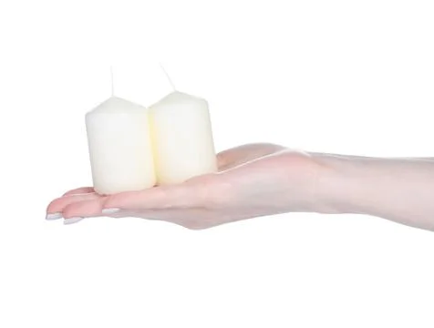 White candles light in hand Stock Photos