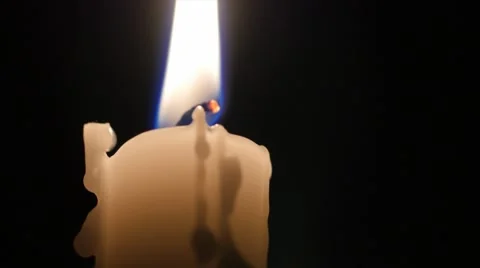 White candlestick in a dark room Stock Footage 47261980