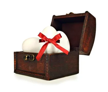 White candy easter eggs in a chest Stock Photos