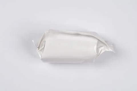 White candy wrapper on light background Stock Photos