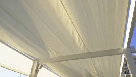 White canopy in cafe blowing in the wind Stock Footage 85150201