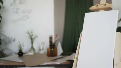 White canvas on an easel. Art. Empty picture Stock Footage 156209909