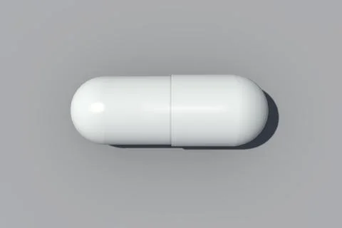 White capsule pill on gray closeup. Mock up realistic pill,copy space Ilustração Stock