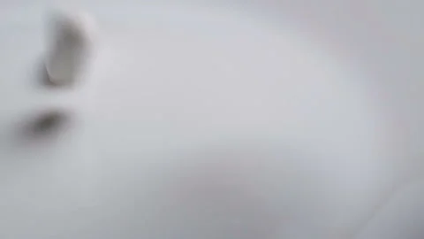 White capsules of the medication is falling down and crumble from the plastic Video stock 98131631