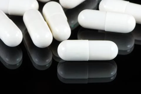 White capsules Stock Photos