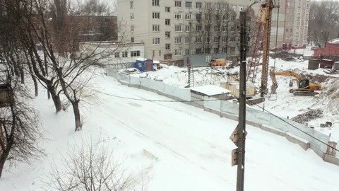White car on background winter construction Stock Footage 71221893