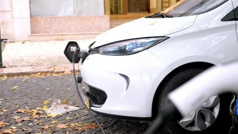 White Car Charging with Station in Foreground Stock Footage 340539215