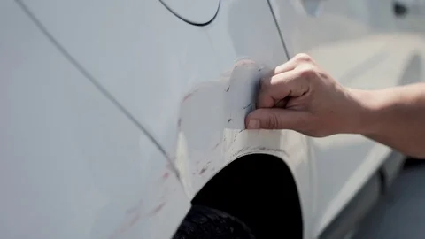 White car damage on white background. Vehicle broken. Video stock 124024040