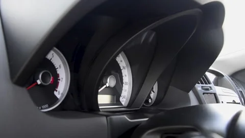 White car dashboard to measure speed, rpm Stock Footage 135681297