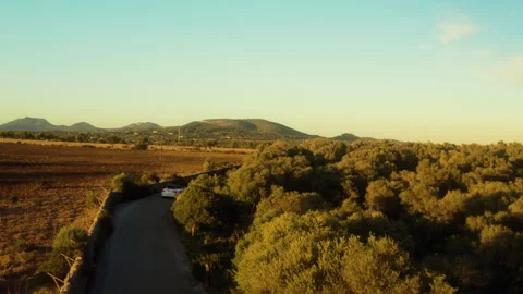 White Car Drives Through Mallorca Countryside Vídeo Stock 346502125