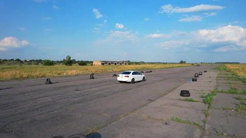 White car is going on road. Drone is following to a car Stock Footage 158028581