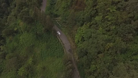 White car mountain forrest Stock Footage 129796002