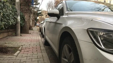 White car parked Stock Footage 146992875