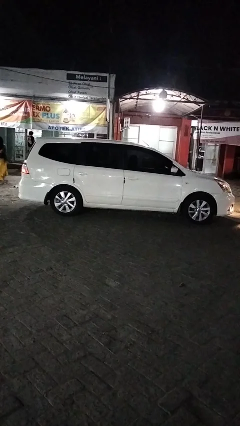 The white car is parked Stock Footage 243194327