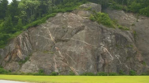 White Car Passing a Cliff on the Blue Ridge Parkway Stock Footage 12742312
