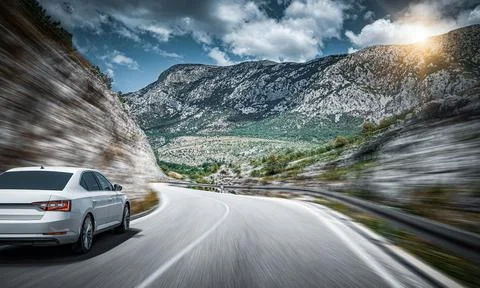 White car on the road. Stock Photos