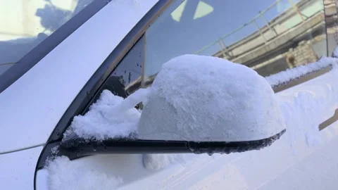White car side mirror covered in thick snow and ice in winter. 스톡 동영상 329850888
