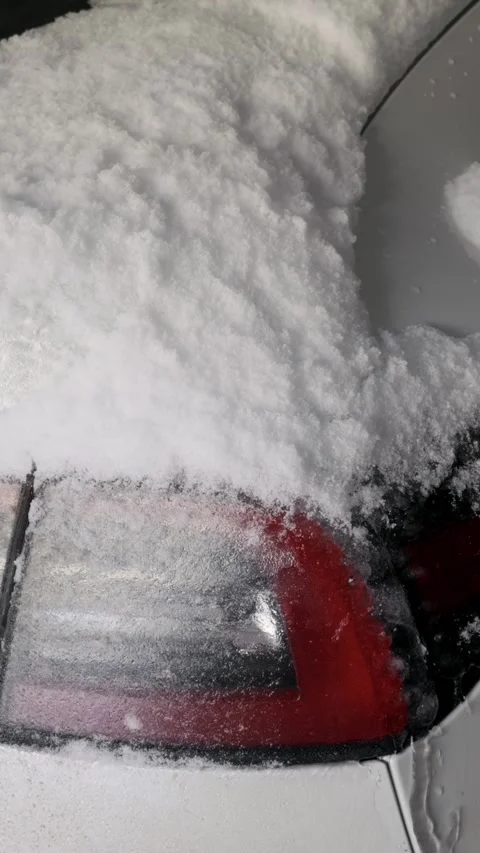 White Car Taillight Covered With Thick Fresh Snow Texture Close Up Stock Footage 329913901