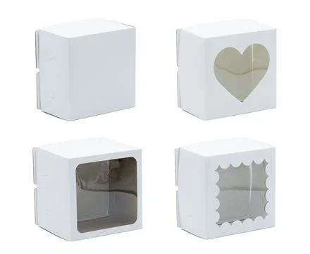 White cardboard boxes with plastic windows of different shape Stock Photos