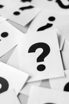 White cards with question marks Stock Photos