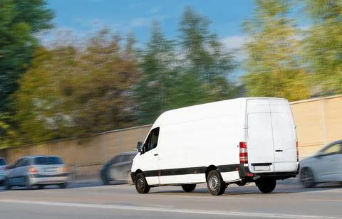 White cargo bus in motion Stock Photos