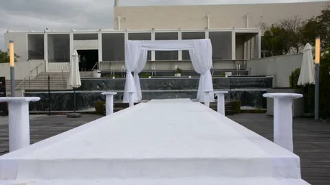 White carpet wedding arch cloudily day Stock Footage 172075966