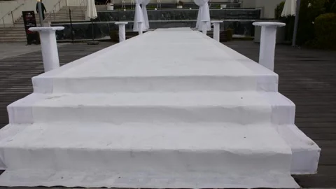 White carpet wedding arch cloudily day Stock Footage 172075971