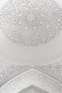 White carved plaster dome ceiling inside Muhammad Amin Khan Madrasa in Khiv.. Stock Photos
