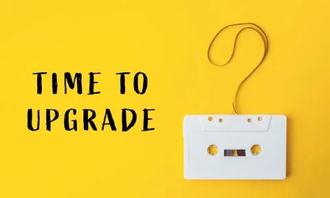 White cassette tape is hanging from a string with a question mark on it Stock Photos