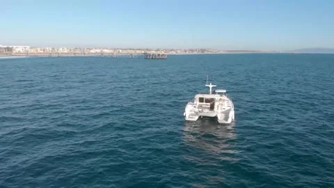 White Catamaran off Venice Beach, 4K Aerial Orbit Stock Footage 149385459