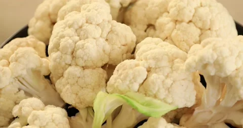 White cauliflower rotating on the turntable Macro view 2 Video stock 141985432