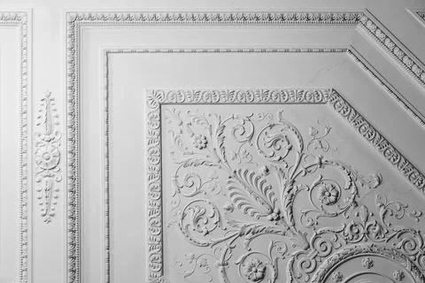 White ceiling design elements in rococo style, bas-relief Stock Photos