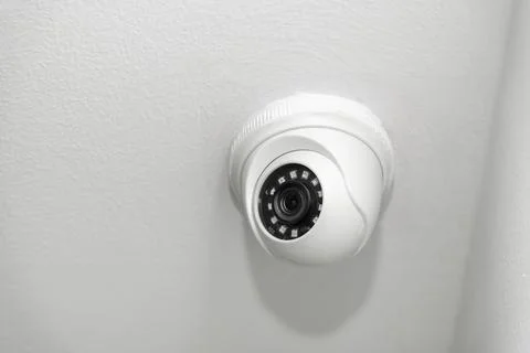 White ceiling mounted security camera with night vision Stock Photos