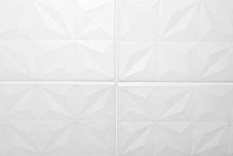 White ceiling tiles made of expanded polystyrene. Stock Photos